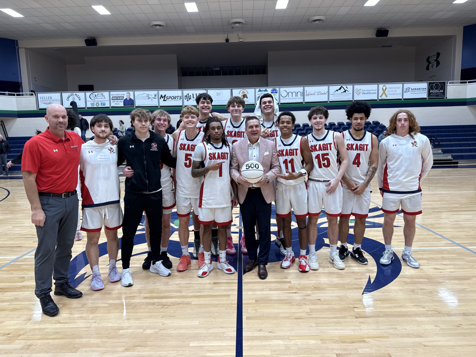 Carl howell and basketball team group photo